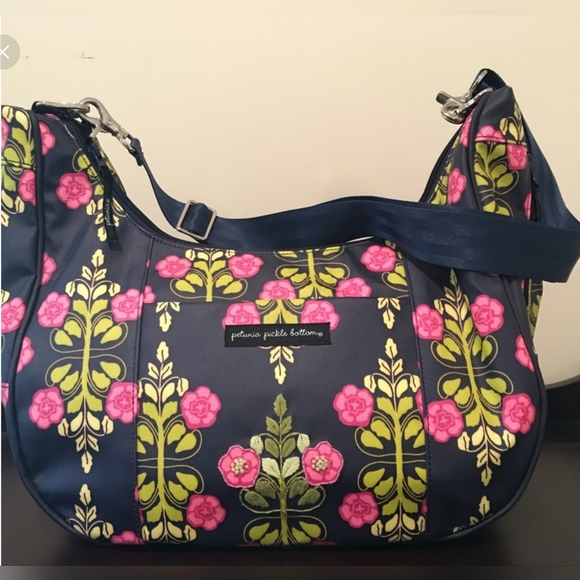 Petunia Pickle Bottom diaper bag in a beautiful blue w/ pink flowers and floral.